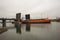 Bulker vessel entering the port, passing the vertical lift bridge