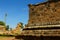 Bull [nandhi] statue with ornamental wall of the ancient Brihadisvara Temple in the gangaikonda cholapuram, india.