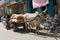 Bull pills cart with load by the street of Jodhpur, India.