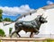 Bull sculpture - Main entrance to bullring in historic fortress town, Rondaâ€“ near Malaga, Spain