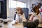 Bulldog And Beagle Dressed As Businessmen At Desk With Computer