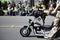 Bulldog riding motorcycle at St. Patrick\'s Day Parade