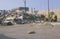 A bulldozer clearing a large pile