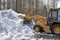 Bulldozer clearing snow