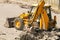 Bulldozer Dismantles Asphalt at Work