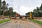 Bulldozer, Excavator and Soil compactor on road work. Earth-moving heavy equipment and Construction machinery  during land