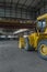 Bulldozer in a large industrial building