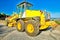 Bulldozer laying asphalt concrete