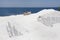 Bulldozer at marble quarry on island