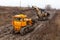 Bulldozer on mud road