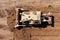 Bulldozer pushing large amount of fresh soil, Aerial shot.