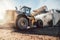 Bulldozer putting biomass on pile for composting