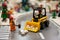 Bulldozer removes some rubble from the street