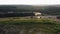 Bulldozer and tractors on the large rural garbage landfill.