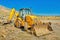 Bulldozer on wheels in a mine