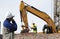 Bulldozer and workers in action