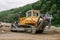 A bulldozer works on road construction.