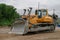 A bulldozer works on road construction.