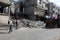 Bulldozers remove the debris from the  building, that was hit by Israeli air strikes during the Israeli-Palestinian conflict in Ma