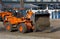 Bulldozers at Work on a Beach