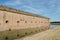 Bullet holes / cannon holes in the brick walls of Fort Pulaski National Monument in Georgia from the Civil War