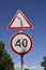 Bullet holes on the speed limit road sign.