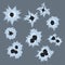 Bullet holes with white cracks and scratches, bullet marks on glass vector illustration on gray background