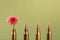 Bullets and beautiful chrysanthemum flower on olive background, space for text