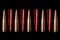 Bullets on black background. Pattern. Symbol of the causes of military conflicts in the world