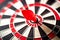 Bullseye Triumph: A Dart Hits the Center of the Dartboard on a W