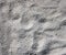 Bumpy dry empty gray sand texture background