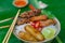 Bun thit nuong - Vietnamese grilled pork and rice noodles: It is a mix of vermicelli noodles, grilled pork, spring rolls, eaten