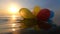 Bunch airy multi-colored balloons swing waves sea sunny summer day sunset Dawn