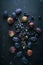 Bunch of blue grapes, figs on dark blue background