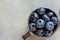 Bunch of Blueberries in Rusty Metal Jug on Gray Concrete Background Scattered Berries Creative Banner Header