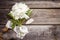 Bunch, bouquet of pink peonies on a wooden background. Frame of flowers