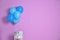 Bunch of bright balloons and gifts on table