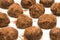 Bunch of chocolate truffles with cocoa powder