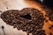 Bunch of coffee beans formed like heart high quality photo