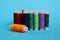 A bunch of colored sewing threads for a seamstress