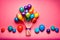 Bunch of colorful balloons isolated on pink background with copy space
