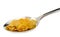Bunch of corn flake cereals on a metal spoon