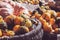 Bunch of decorative mini pumpkins and gourds in baskets on farmers market; autumn background