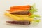 Bunch of differently coloured heritage carrots