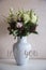 Bunch of elegant flowers in vase as love or Valentines day attribute