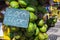 Bunch of fresh coco verde (green coconuts) hanging at Ipanema beach sidedwalk in Rio de Janeiro