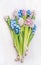 Bunch of fresh colorful hyacinths flowers, top view.