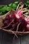 Bunch of fresh organic beets on rustic wooden table