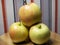 A bunch of gala apples. A few fruits, a close-up shot