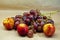 Bunch of grapes with nectarine close-up on a beige background
